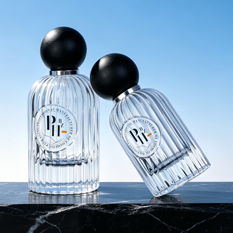 Cosmetic packaging — Custom Ribbed Glass Perfume Bottle 50ml 100ml Clear Refillable Spray Container with Matte Round Ball Lid Press Spray Head