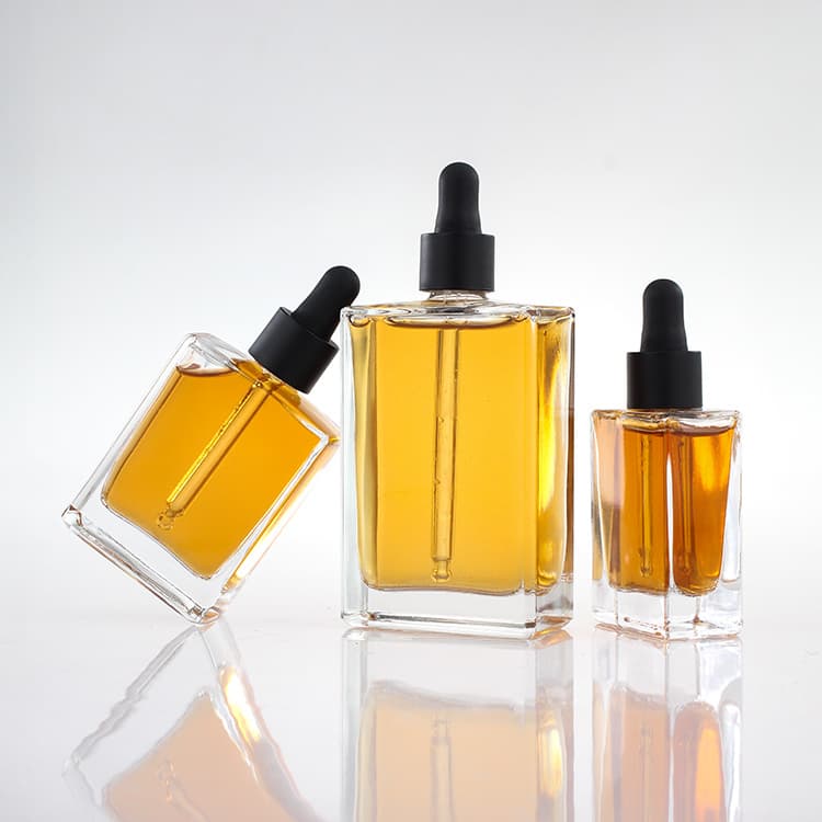 Cosmetic packaging — 30ml 50ml 100ml Square Luxury Glass Dropper Bottles with Black Gold Collar Hot Stamped for Serum Elixir Essential Oil
