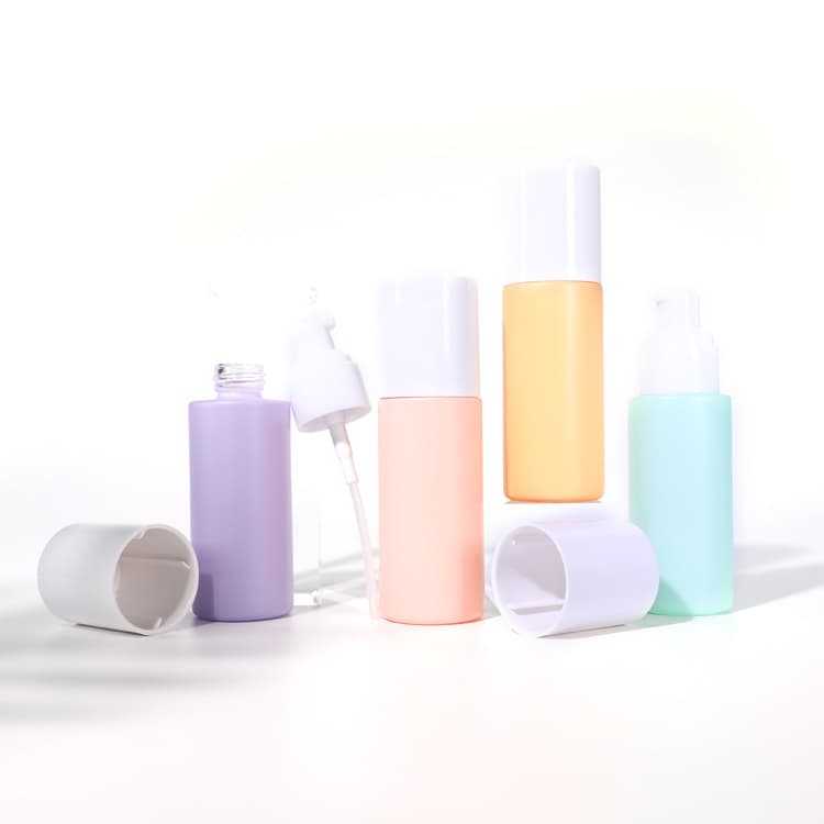 Cosmetic packaging — New Style Empty Candy Solid Colors Cosmetic Lotion Bottle 50ml White Cap Cylindrical Serum Lotion Pump Glass Bottle