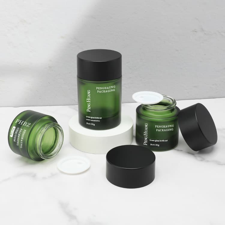 Cosmetic packaging — Reliable 20g/30g/50g Green Glass Round Cosmetic Jars Flat Top Screw Cap CE Certified Empty Skin Care Jar Black Lid