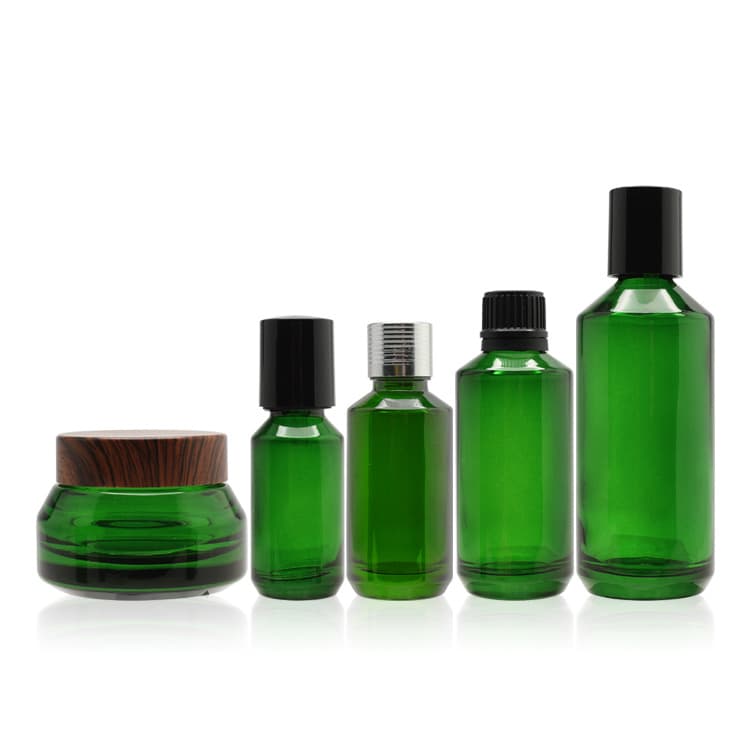 Cosmetic packaging — Wholesale Custom Empty Cosmetic Container Set Jar and Bottle Green Makeup Glass with Wooden Screw Cap Dropper Bottle Green PHT