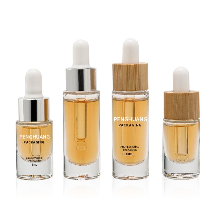 Cosmetic packaging — Wholesale cosmetic 5ml 10ml round bamboo collar facial essential oil glass dropper bottle skin care glass serum bottles