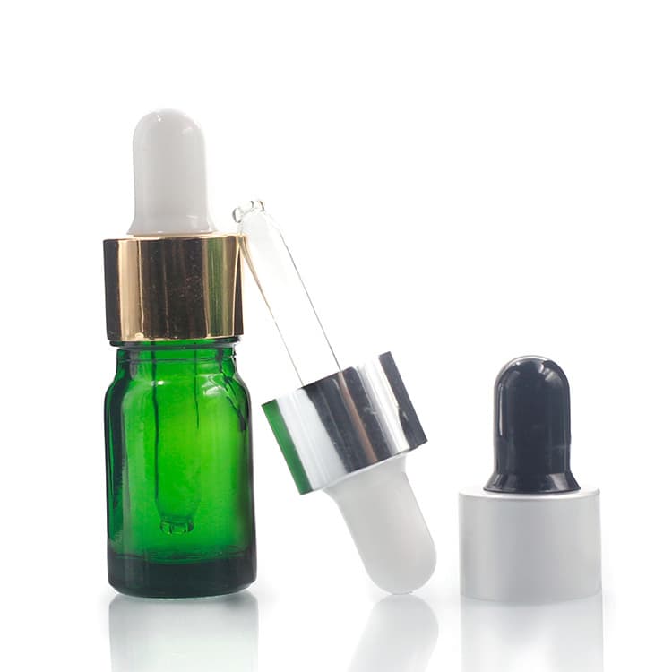 Cosmetic packaging — Manufacturers wholesale 5ml green colored glass bottles  for Essential Oil with glass Dropper