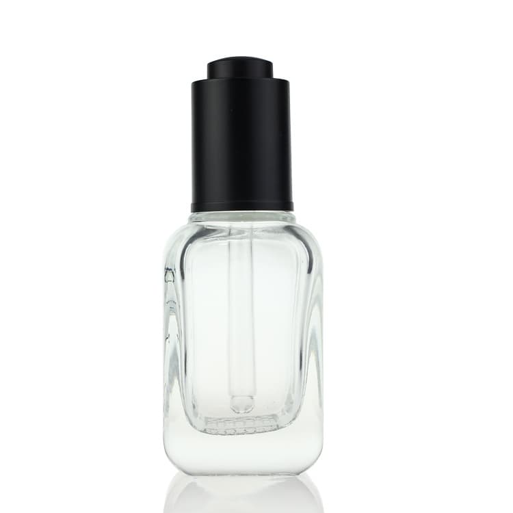 Cosmetic packaging — 50ml clear square essential oil serum glass bottle with push button dropper