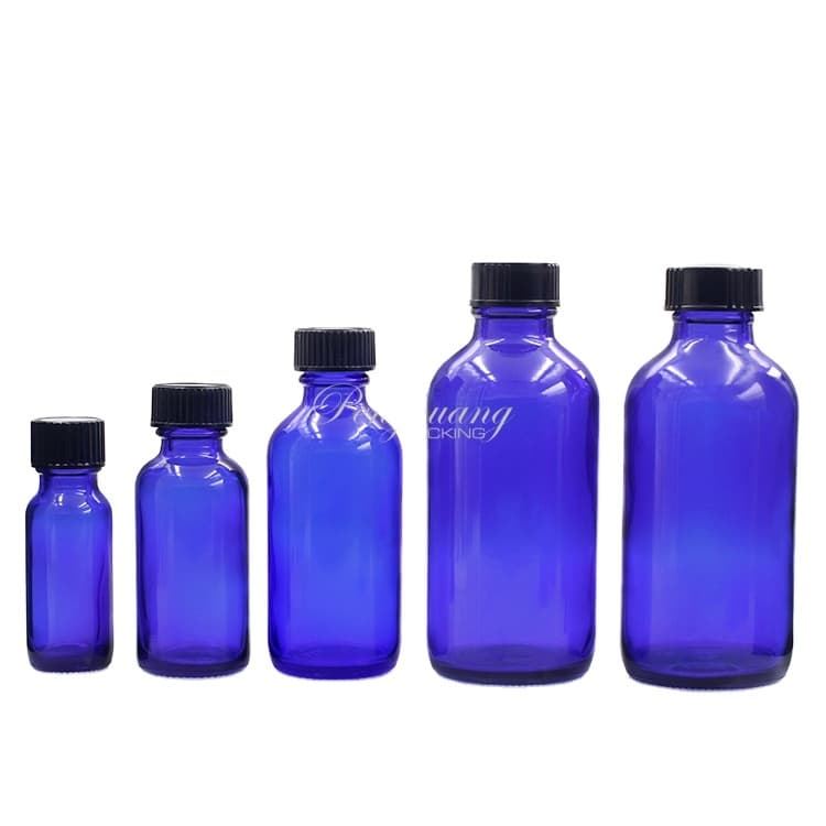 Cosmetic packaging — Blue Perfume Bullet Boston Round Glass Bottles With Black Lid