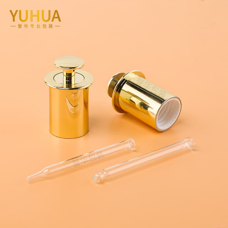 Cosmetic packaging — Wholesale Luxury empty 20mm 20/410 gold aluminum press pump plastic dropper cap for essential oil serum bottle
