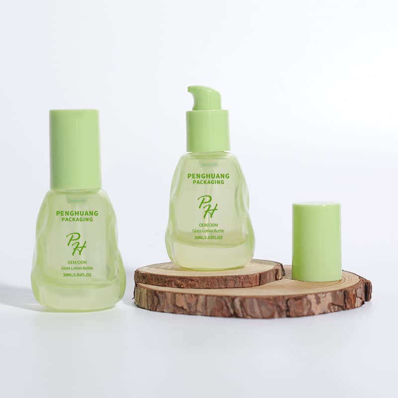 Cosmetic packaging — Custom Fancy Green 30ml Glass Hair Oil Bottle Irregular Lovely Hand Pinch Design Essential Oil Moisture Cosmetics Serum Retort