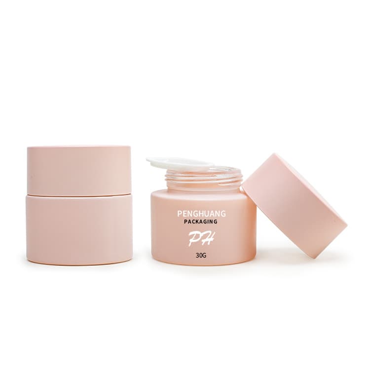 Cosmetic packaging — Luxury Cosmetic Glass Cream Jar Container pink 30g 50g 100g Custom Face Cream Jars Moisturiser Sun-block Skincare Packaging