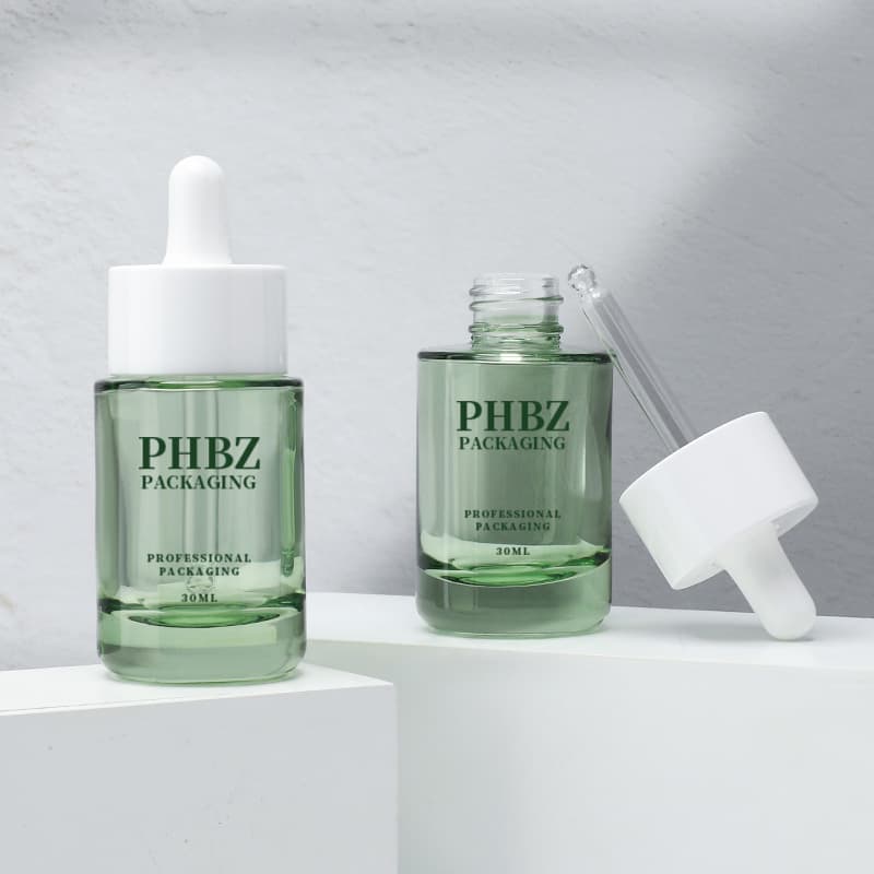 Cosmetic packaging — Luxury 30ml 1oz Flat Shoulder Glass Dropper Bottle Green Transparent Face Oil Serum Glass Bottle with Dropper Cap