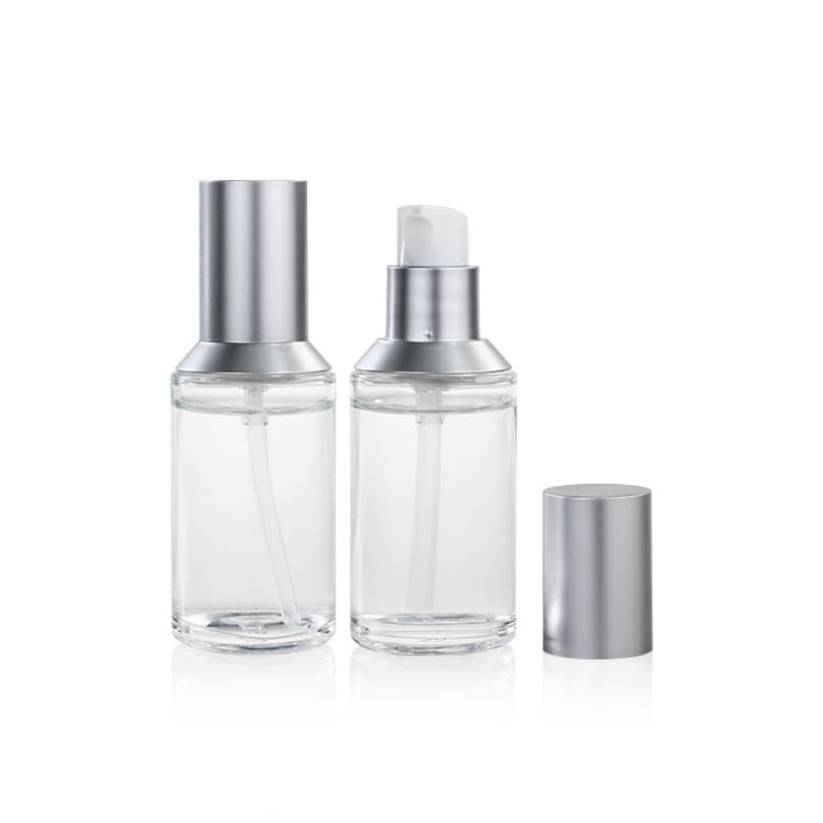 Cosmetic packaging — Wholesale 50ml clear round shaped liquid foundation makeup lotion glass bottle pump frosted cosmetic packaging for skin care OEM