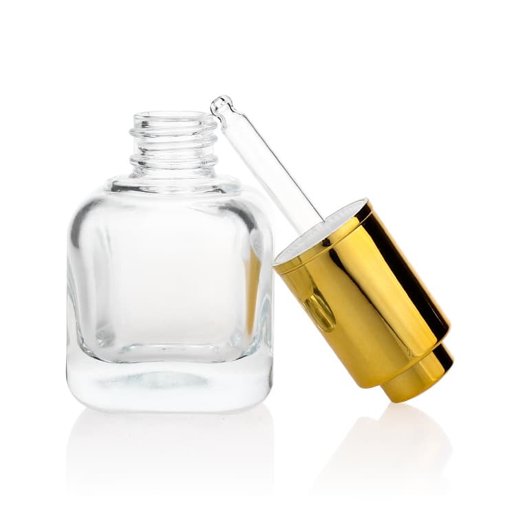 Cosmetic packaging — Hot selling 30ml clear glass oil serum essential bottles with gold aluminium collar dropper cosmetic manufacturer