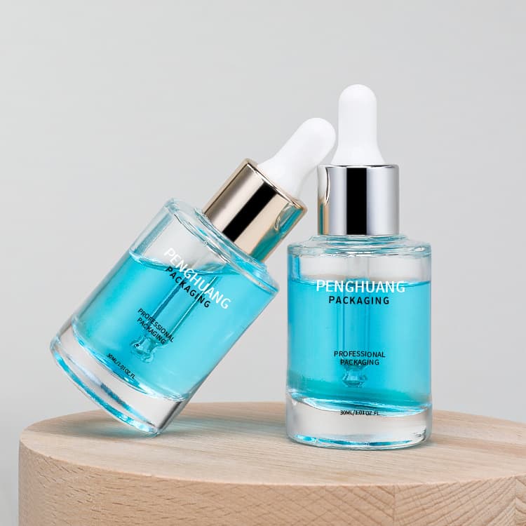 Cosmetic packaging — Custom Round Empty Essential Oil Bottle 1oz 30ml 50ml Transparent Skin Care Hair Oil Glass Serum Dropper Bottle