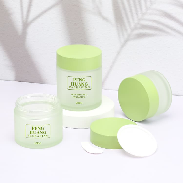 Cosmetic packaging — Wholesale Cosmetic Jar Packaging 80g 150g 200g Empty Frosted Green Glass Cosmetic Jar with Scoop