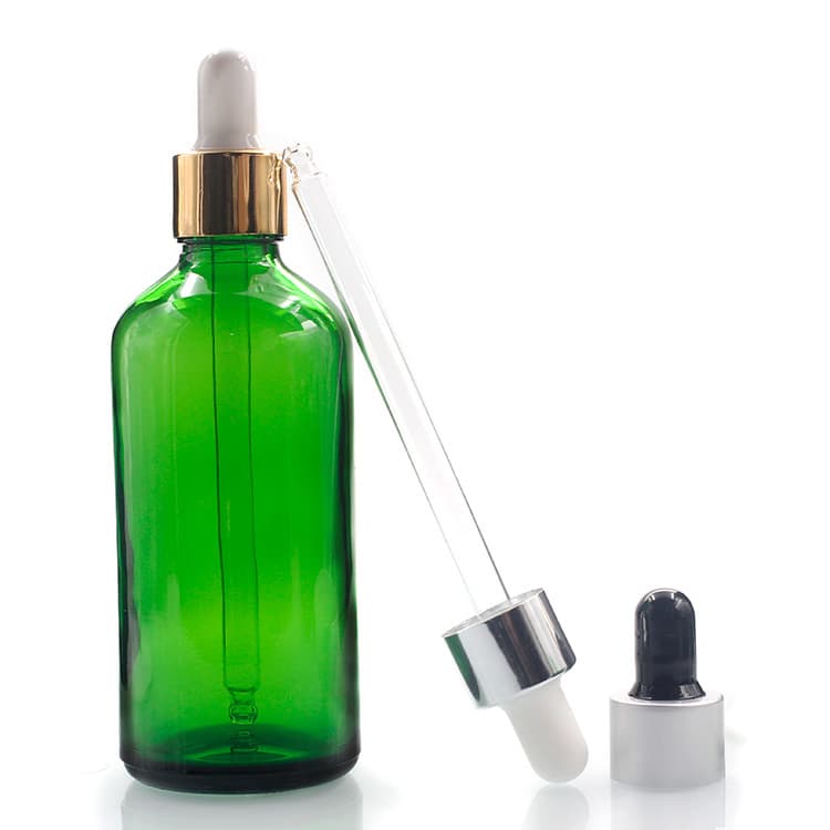 Cosmetic packaging — Wholesale 100ml green colored essential oil bottle 4oz glass bottle with dropper glass bottles manufacturer