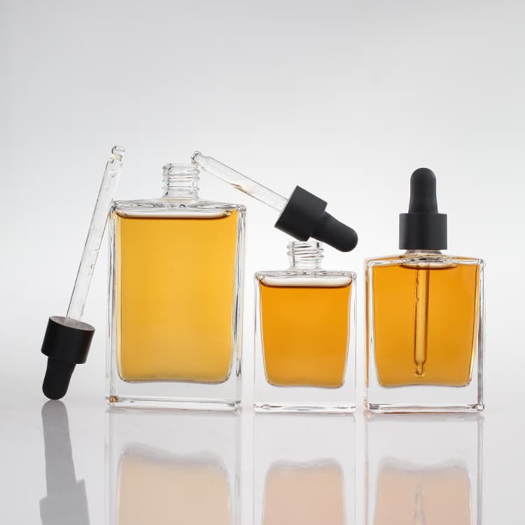 Cosmetic packaging — Custom Clear Square 30ml 50ml 100ml Glass Serum Cosmetic Essential Oil Dropper Bottle with Black Aluminum Cap