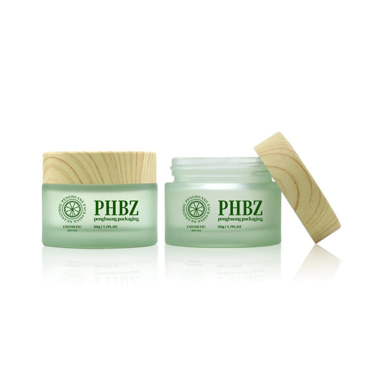 Cosmetic packaging — Factory Wholesale Facial Moisturize Jars Bamboo Cap Cream Glass Jar Container 50g Frosted Wide Mouth Glass Cosmetic Cream Jar