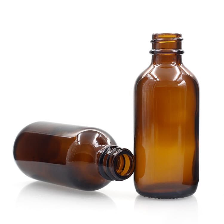 Cosmetic packaging — Essential oil glass bottle amber color blue color available 1oz 30ml 2oz 60ml  Amber Boston Round with Black Poly Cap