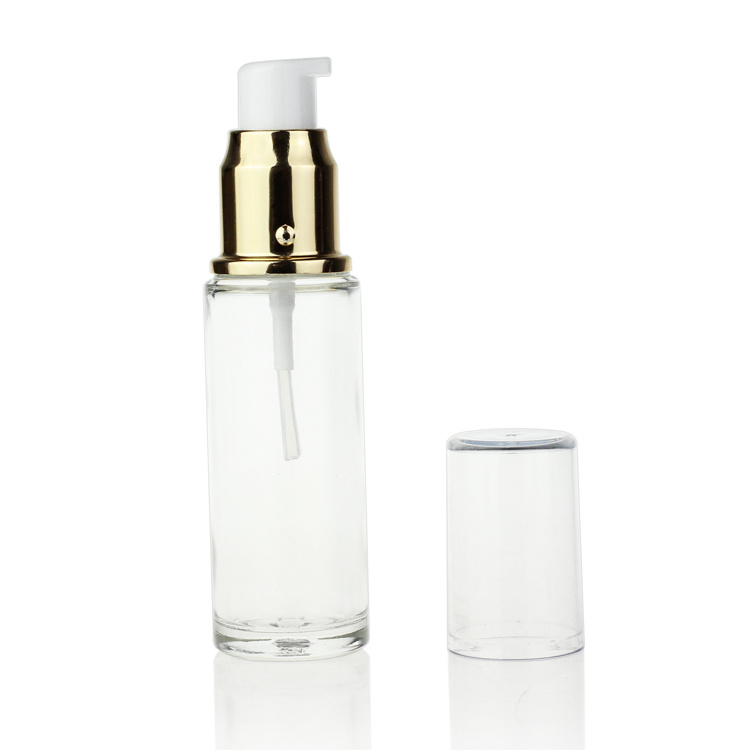 Cosmetic packaging — 20ml 30ml round shape clear foundation serum glass bottle with gold pump (2)